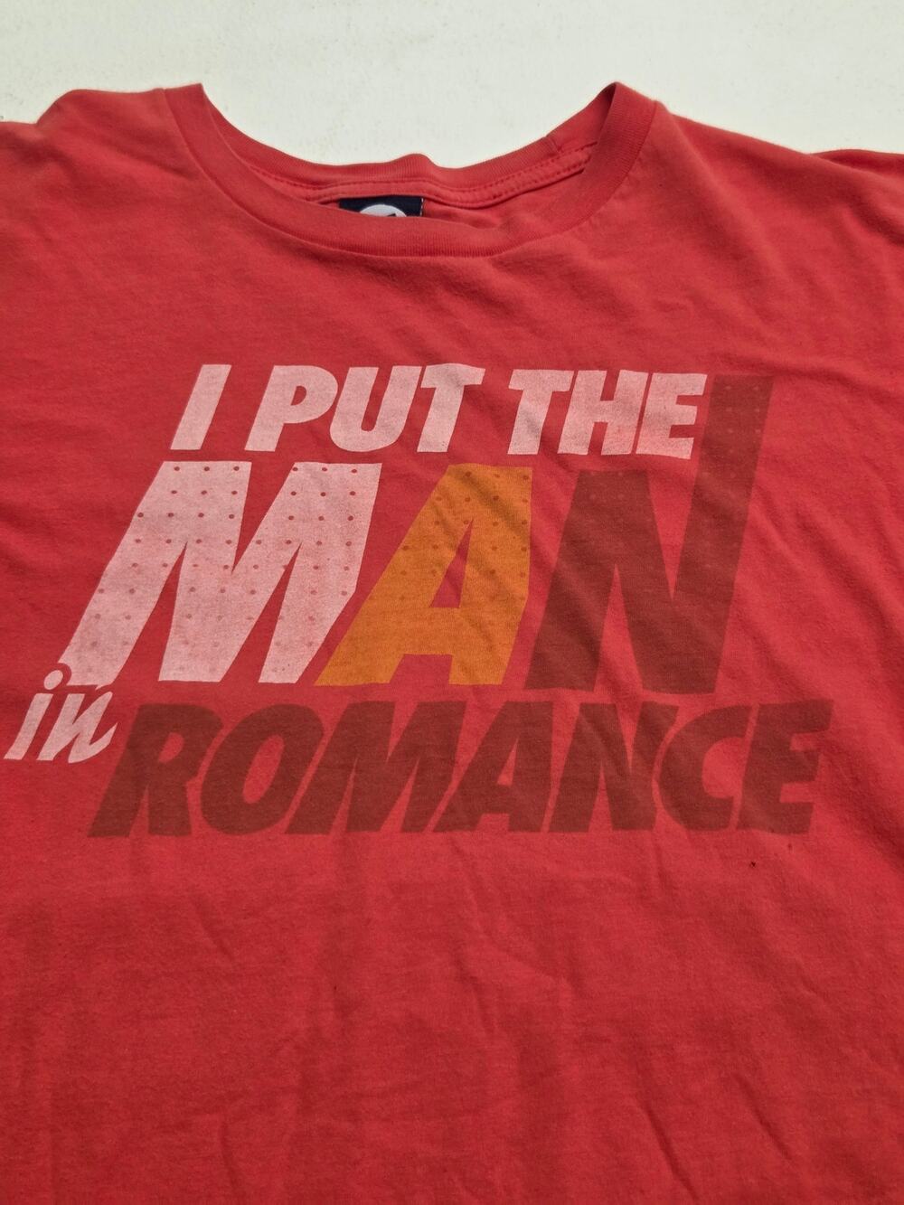 Local Celebrity I Put The MAN in ROMANCE Graphic T Shirt Red XL Confidence